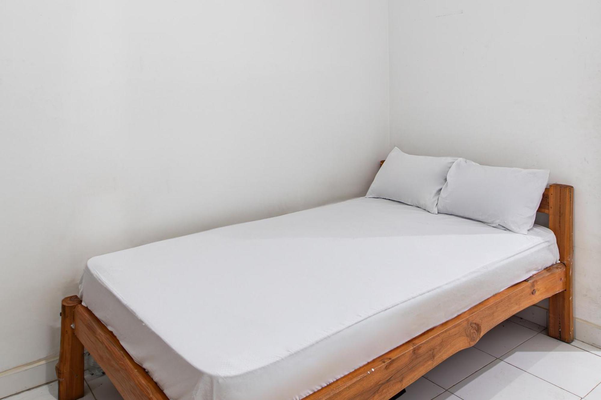 Hotel Oyo Life 93504 Kost Krisna à Temukus Extérieur photo